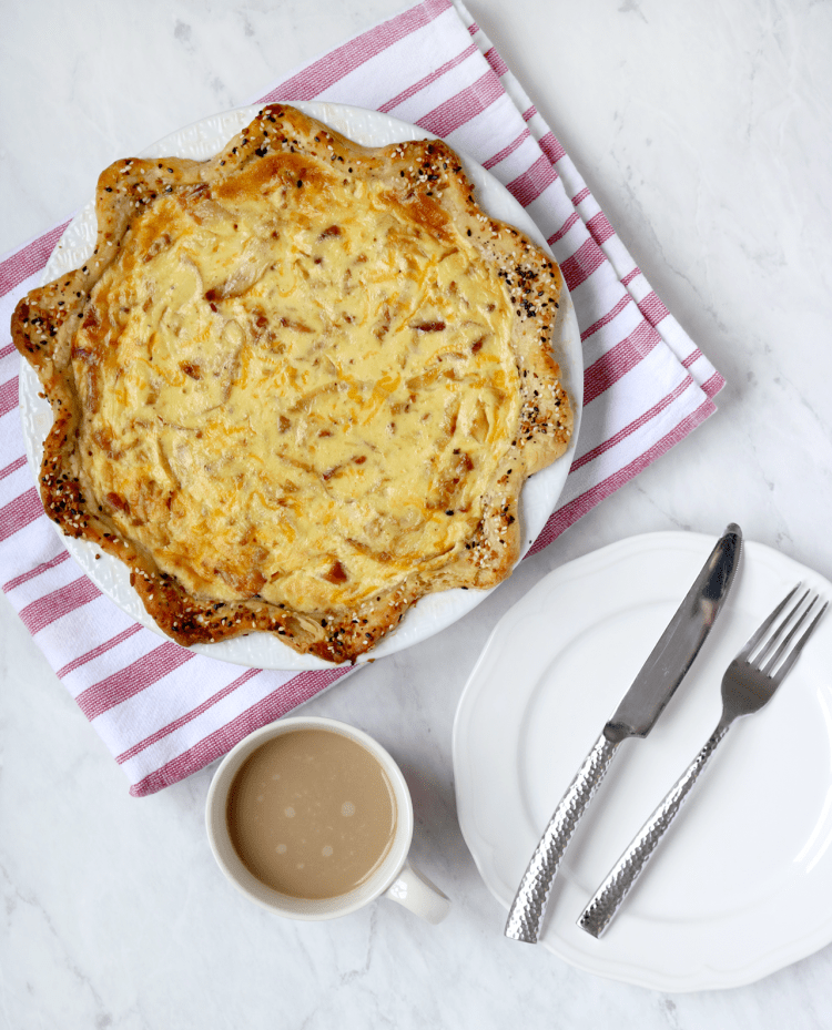 Bacon, Egg, and Cheese Breakfast Pie with everything bagel seasoning and caramelized onions. Perfect recipe idea for a big brunch | via Pies Before Guys